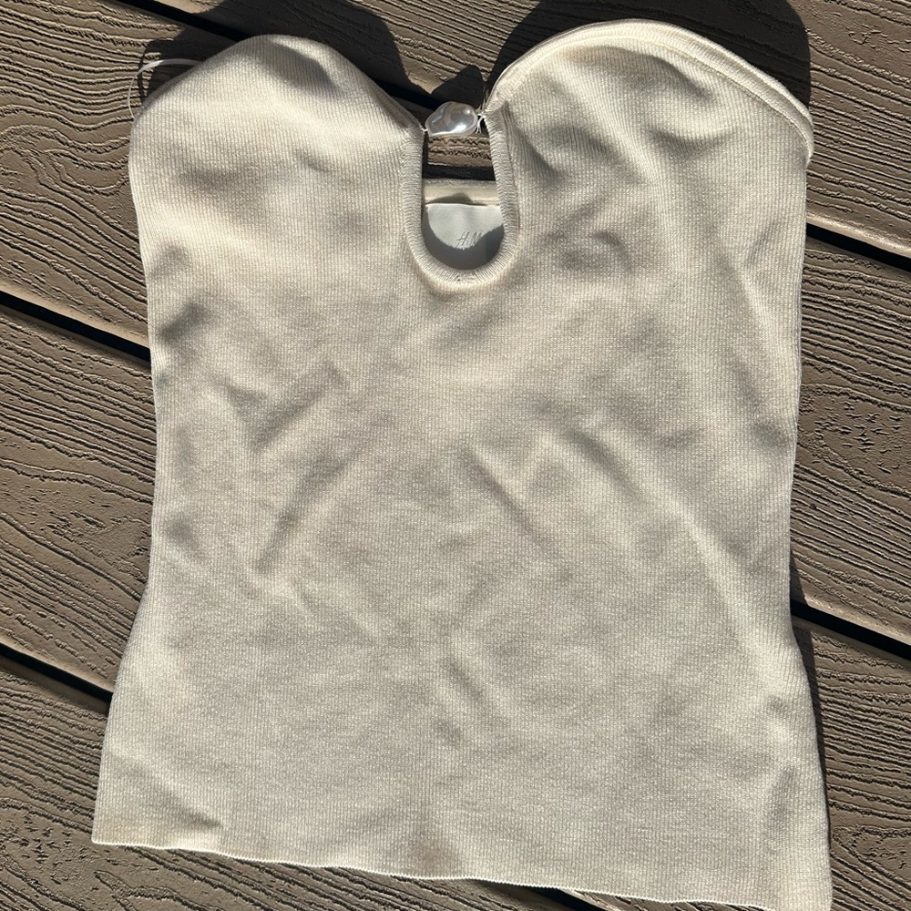 Cream strapless top with faux pearl